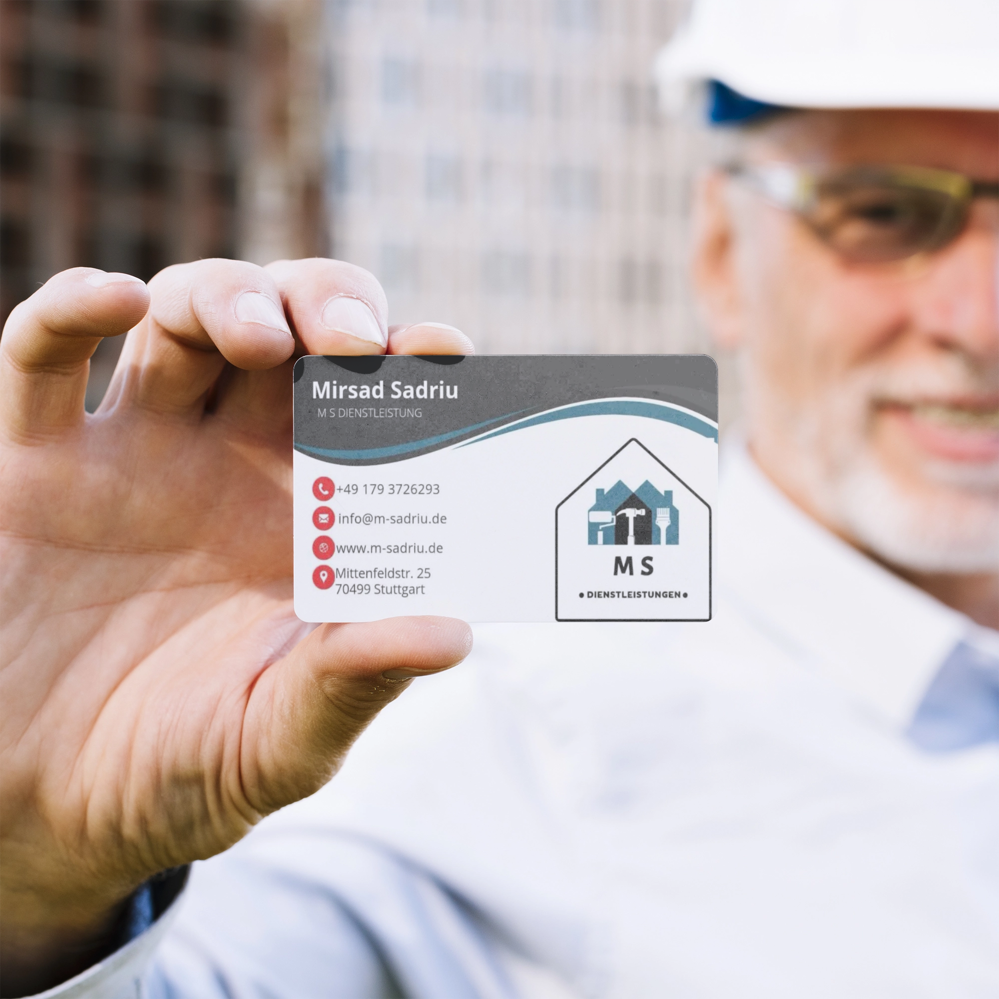Architect holding a business card mock-up (2)